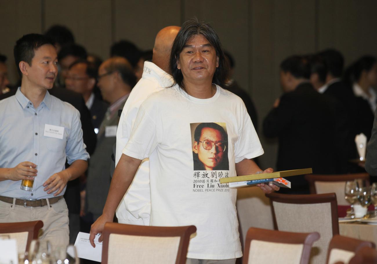 L'ancien parlementaire hongkongais Leung Kwok-hung, alias "Long hair", en juin 2013. [KEYSTONE - KIN CHEUNG]