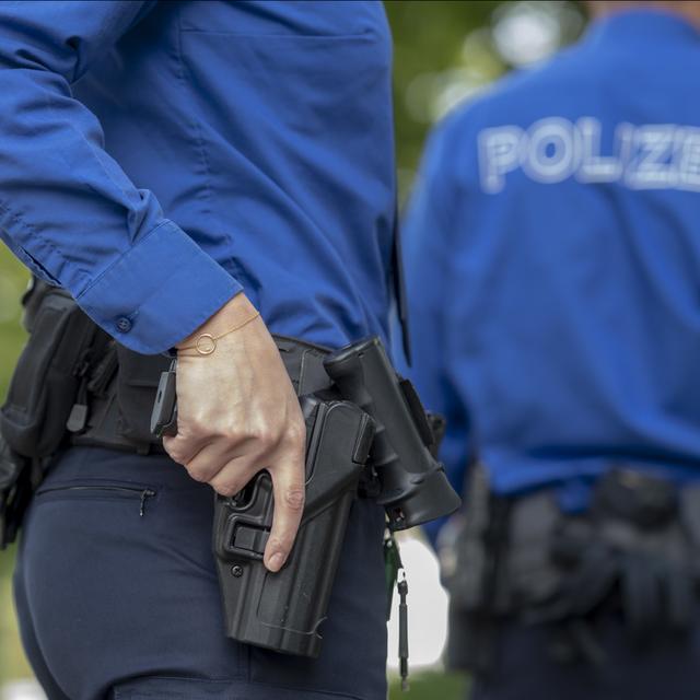 La police a recouru deux fois aux armes à feu l'année dernière en Suisse [Keystone - Georgios Kefalas]
