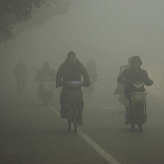 La pollution atmosphérique est une préoccupation majeure des travailleurs chinois. [Keystone/AP Photo - DR]