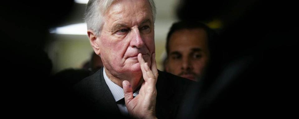 En France, Michel Barnier craint "des turbulences" sur les marchés si son gouvernement tombe. [Keystone]