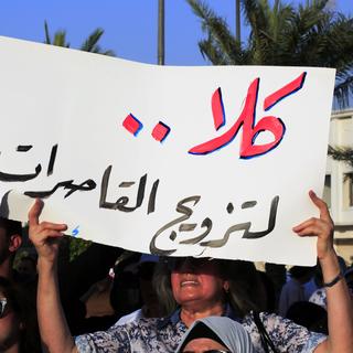 Manifestation à Bagdad contre une loi qui autorise le mariage pour les filles dès 9 ans. Le 8 août 2024. [EPA/KEYSTONE - Ahmed Jalil]