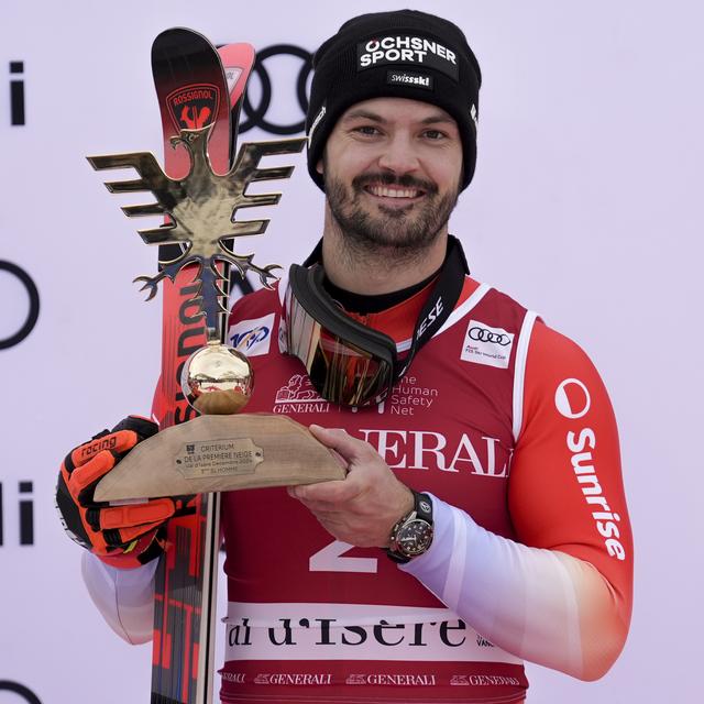 Le skieur Loïc Meillard a fini troisième au slalom du Val d'Isère. [Keystone/AP Photo - Giovanni Auletta]