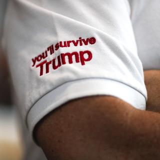 Un supporter du candidat et futur président Donald Trump. [Keystone/EPA - Rungroj Yongrit]