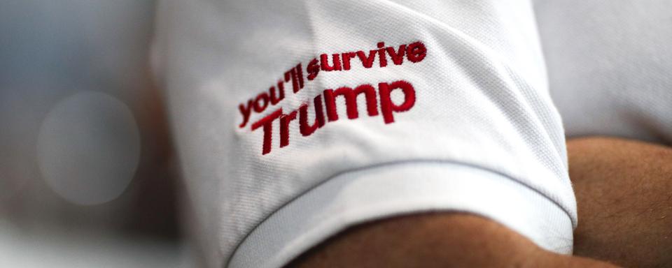 Un supporter du candidat et futur président Donald Trump. [Keystone/EPA - Rungroj Yongrit]