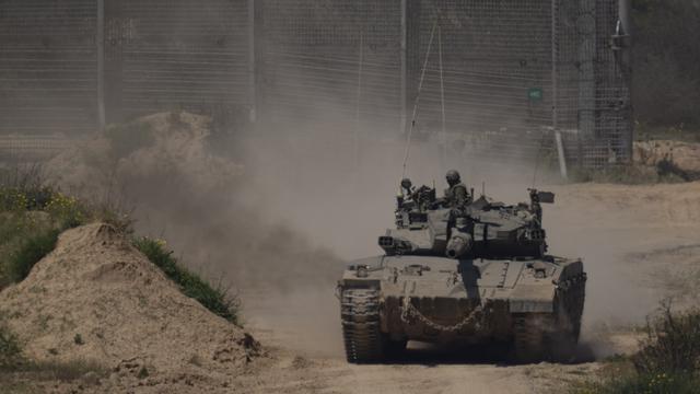 Un blindé de l'armée israélienne. [KEYSTONE - LEO CORREA]