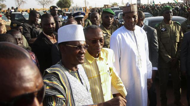 Les Premiers ministres du Niger, Ali Mahamane Lamine Zeine, du Burkina Faso, Apollinaire Joachim Kyelem de Tambela, et du Mali, Kokalla Maiga, le 29 décembre 2023 à Niamey, la capitale du Niger. [Reuters - Mahamadou Hamidou]