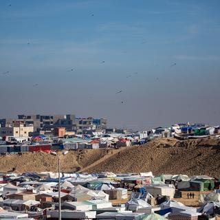 Un camp de déplacés dans le sud de la bande de Gaza. [KEYSTONE - HAITHAM IMAD]