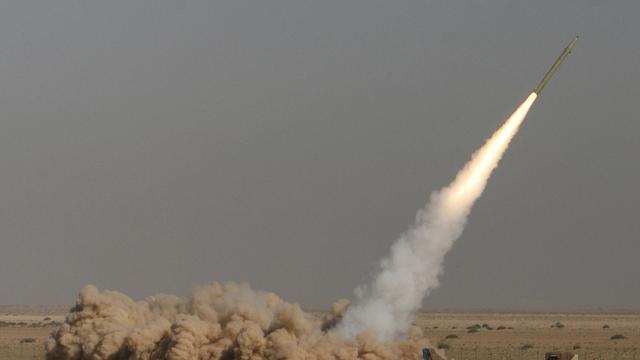 FILE - In this photo released by the Iranian semi-official Fars News Agency, Revolutionary Guard's Fateh missile is launched in a drill near the city of Qom, 80 miles (130 kilometers) south of the capital Tehran, Iran, Sept. 27, 2009. (Ali Shaigan/Fars News Agency via AP File) [Keystone - Ali Shaigan]