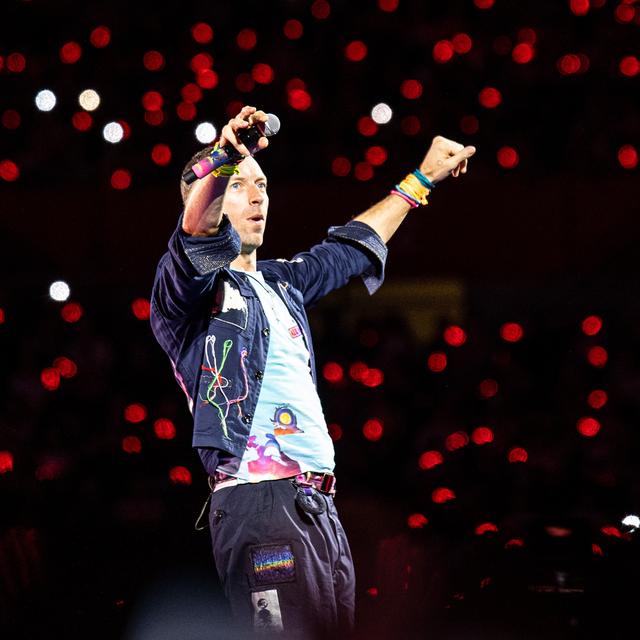 Le chanteur du groupe pop Coldplay en concert à Vienne. [Keystone/APA - Tobias Steinmaurer]