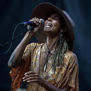 La chanteuse allemande et nigériane Ayo en concert à Toulouse en 2021. [Hans Lucas via AFP - Frédéric Scheiber]