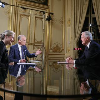 Le Premier ministre français Michel Barnier a été interviewé sur TF1 et France 2 mardi soir. [Keystone/EPA - Thomas Samson]