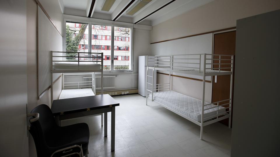 L'une des chambres d'un centre pour requérants d'asile à Genève. Image d'illustration. [Keystone - Salvatore Di Nolfi]