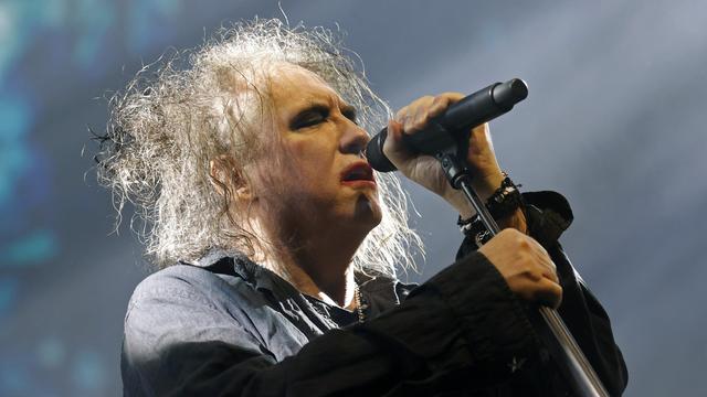 Robert Smith, membre du groupe The Cure, en concert à Bogota en décembre 2023. [EPA/Keystone - Mauricio Duenas]