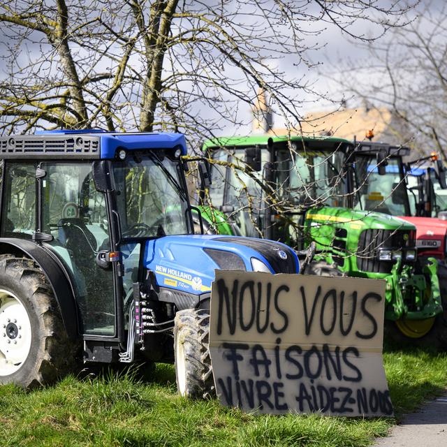 Action "Feu de protestation pour l'agriculture" du groupe "Révolte agricole Suisse", samedi 24 février 2024 à Lussy-sur-Morges. [Keystone - Laurent Gilliéron]