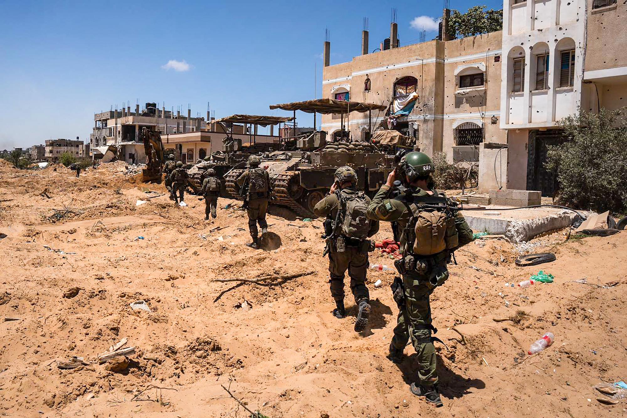 Des soldats israéliens en patrouille dans la bande de Gaza lors d'une opération militaire. [AFP - -]