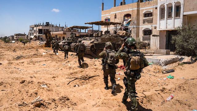 Des soldats israéliens en patrouille dans la bande de Gaza lors d'une opération militaire. [AFP - -]