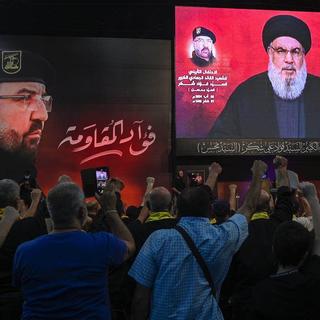 Le chef du Hezbollah a affirmé que sa formation et l'Iran étaient "obligés de riposter" à Israël. [Keystone]