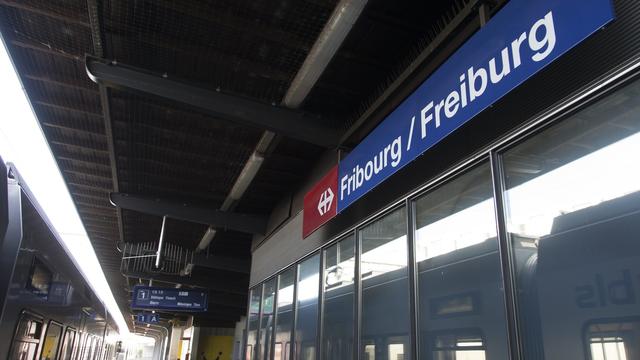 La gare de Fribourg, en août 2012. [KEYSTONE - PETER KLAUNZER]