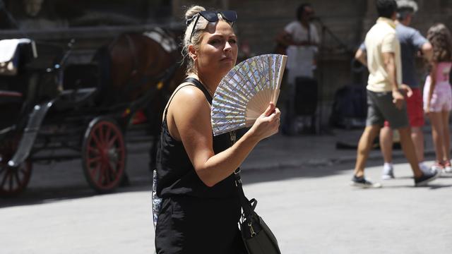 Le record de température de 48,8°C en Europe confirmé par l'ONU. [Keystone - Alberto Lo Bianco]