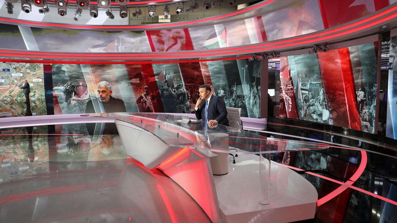 Al Jazeera est une chaîne de télévision qatarie, qu'Israël accuse d'être proche du mouvement du Hamas (image d'illustration). [Keystone - Arafat Barbakh]