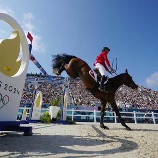 Steve Guerdat remporte la médaille d'argent en saut d'obstacles. [AP Photo/Keystone - Mosa'ab Elshamy]