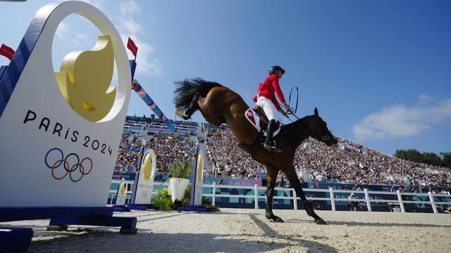 Steve Guerdat remporte la médaille d'argent en saut d'obstacles. [AP Photo/Keystone - Mosa'ab Elshamy]