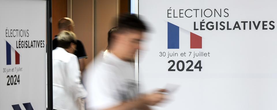 Attente des résultats pour les législatives en France. [Keystone - Martial Trezzini]