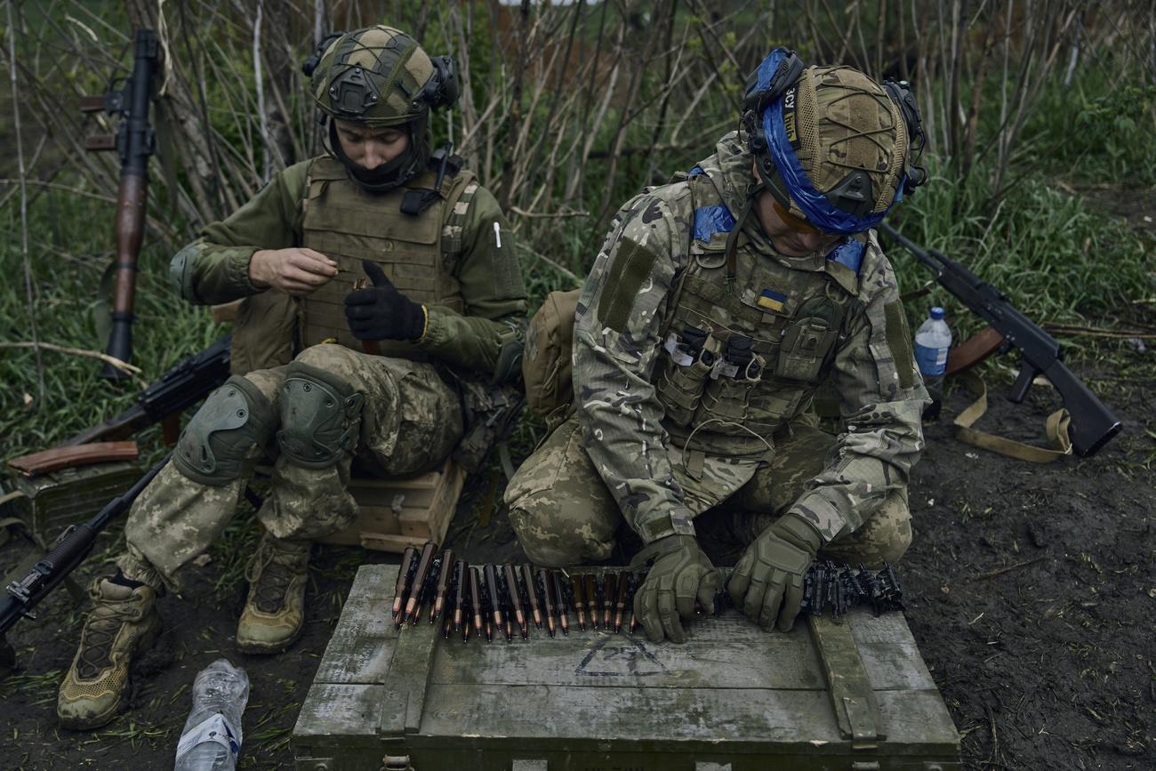 Des soldats ukrainiens dans la région de Vuhledar (image d'illustration). [KEYSTONE - LIBKOS]