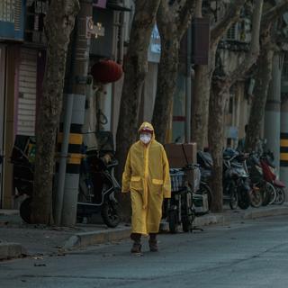 L'anniversaire symbolique des 5 ans du covid en Chine. [Keystone - EPA/Alex Plavevski]