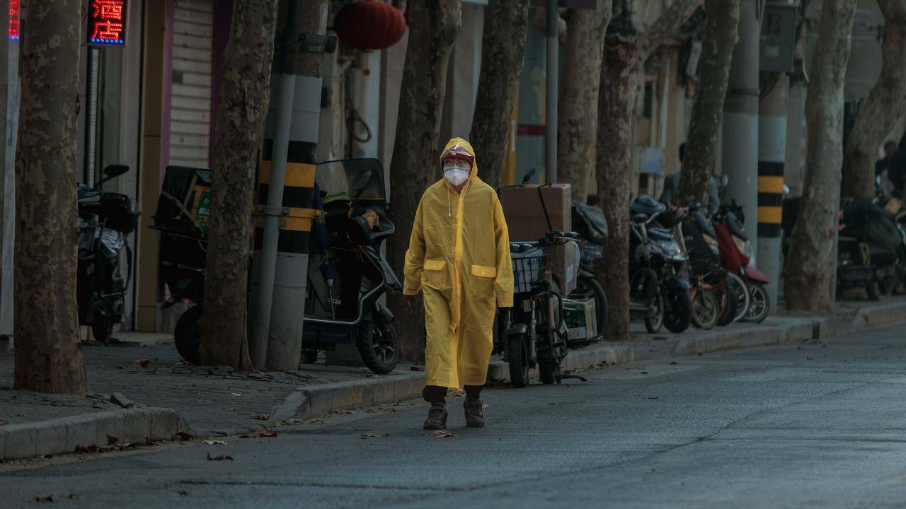 L'anniversaire symbolique des 5 ans du covid en Chine. [Keystone - EPA/Alex Plavevski]