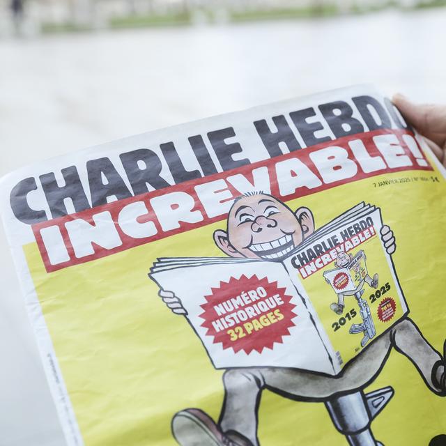 Numéro spécial dix ans après l'attentat de Charlie Hebdo. [KEYSTONE - TERESA SUAREZ]