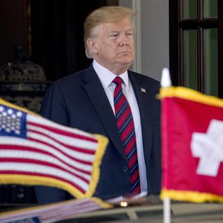 Donald Trump lors d'une visite d'un conseiller fédéral à Washington en 2019. [Keystone/AP Photo - Andrew Harnik]