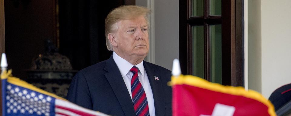 Donald Trump lors d'une visite d'un conseiller fédéral à Washington en 2019. [Keystone/AP Photo - Andrew Harnik]