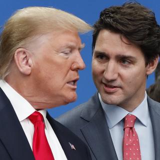 Le chef d'État canadien Justin Trudeau aurait éventuellement démissionné à cause des déclarations agressives de Donald Trump sur une ''annexion'' économique et politique du pays. [Keystone/AP Photo - Frank Augstein]