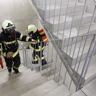 Des pompiers volontaires genevois. [KEYSTONE - SALVATORE DI NOLFI]