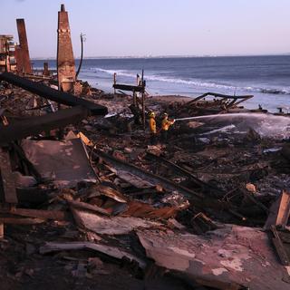 Le bilan des incendies de Los Angeles s'est alourdi avec 24 morts ce lundi. [San Francisco Chronicle via AP / Keystone - (Scott Strazzante]