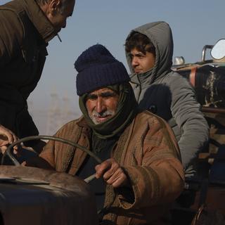 Des réfugiés kurdes arrivent dans le camp de Raqqa. [AP Photo / Keystone - Hogir El Abdo]