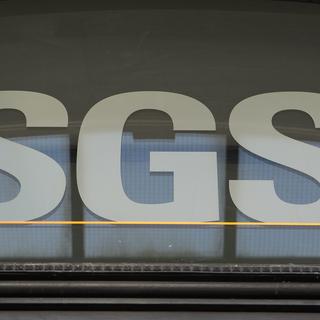 Le logo de la Société Générale de Surveillance Group, SGS, au siège du leader mondial de l'inspection, de la vérification, du test et de la certification, à Genève, en 2012. [Keystone - Salvatore Di Nolfi]