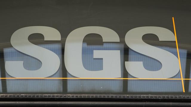 Le logo de la Société Générale de Surveillance Group, SGS, au siège du leader mondial de l'inspection, de la vérification, du test et de la certification, à Genève, en 2012. [Keystone - Salvatore Di Nolfi]