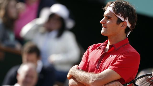 Roger Federer attend de pied ferme Novak Djokovic. [Kerim Okten]