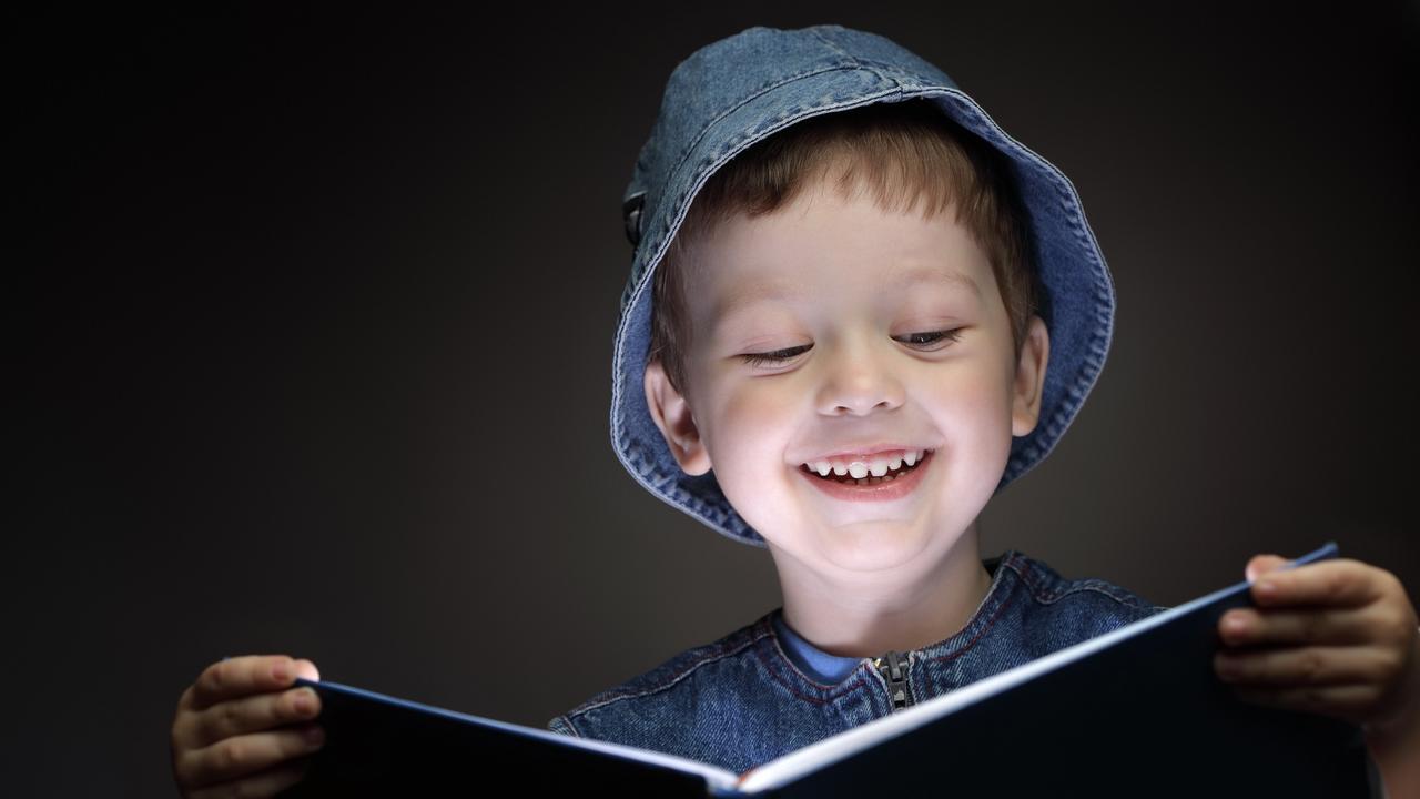 little boy read book. [Chepko Danil]