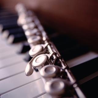 Récital flûte-piano. [CréditJupiterimages - Comstock Images]