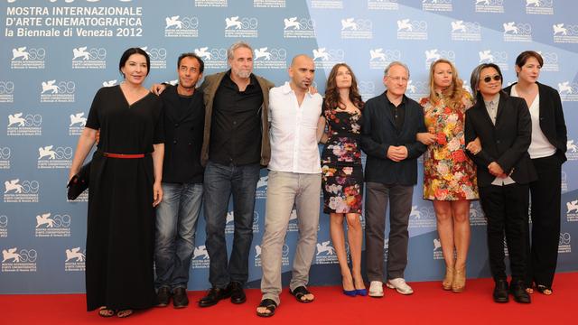 Le Jury de la 69e édition du Festival cinématographique de Venise: de gauche à droite: Marina Abramovic, Matteo Garrone, Ari Folman, Pablo Trapero, Laetitia Casta, le président Michael Mann, Samantha Morton, Peter Ho-Sun Chan et Ursula Meier. [Tiziana Fabi]