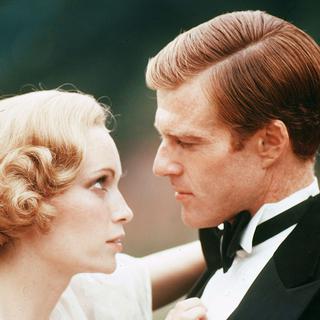 Mia Farrow et Robert Redford dans le film "Gatsby le magnifique" de Jack Clayton (1974). [Paramount / The Kobal Collection / AFP]