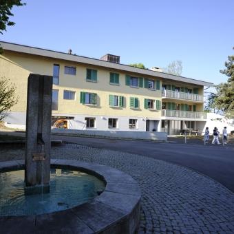 Un des bâtiments du village d'Aigues-Vertes à Bernex, qui accueille des personnes présentant une déficience intellectuelle. [Fondation Aigues-Vertes - F. Piraud]