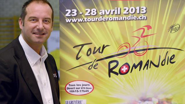 Richard Chassot et l'affiche 2013 du Tour de Romandie. [Christian Brun]