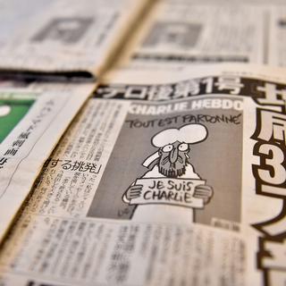 Même les journaux japonais ont publié des caricatures à la suite du massacre à "Charlie Hebdo". [Kazuhiro Nogi]