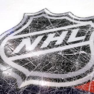 Le logo de la NHL sur la glace de la Nationwide Arena de Columbus, en Ohio. 
Bruce Bennett/Getty Images
AFP [AFP - Bruce Bennett/Getty Images]
