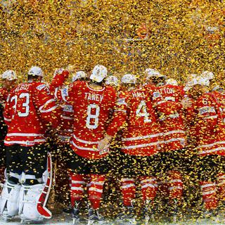 L'équipe du Canada fête la victoire au Championnat du monde 2016 de hockey.
EPA/Sergei Ilnitsky
Keystone [Keystone - EPA/Sergei Ilnitsky]