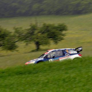 Le multiple champion Sébastien Loeb durant le Rallye du Chablais en 2013.
Maxime Schmid
Keystone [Keystone - Maxime Schmid]